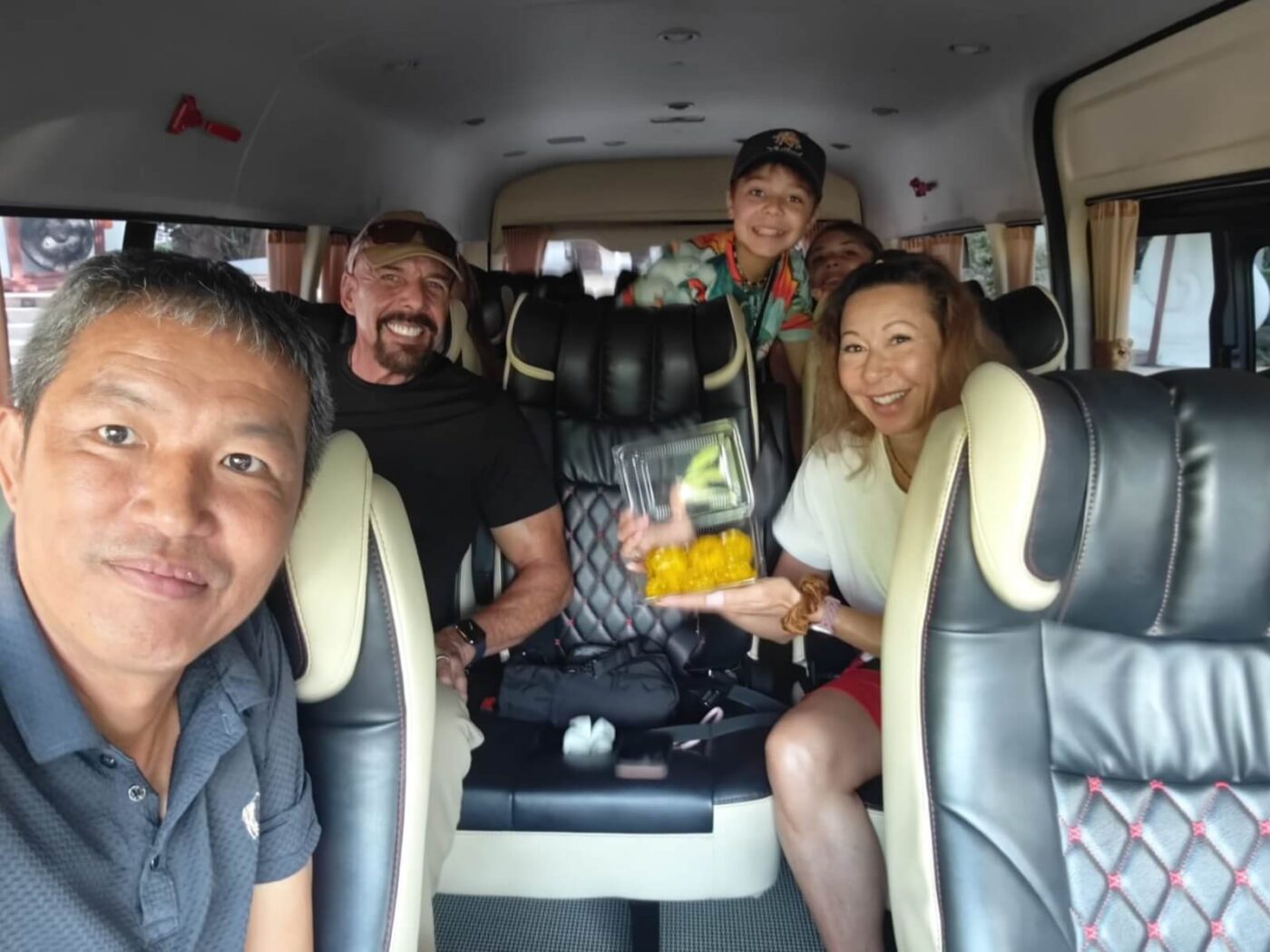 family in VIP minivan private tour from chiang mai to chiang rai
